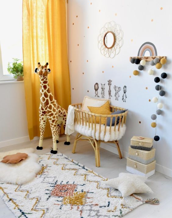 a bright and cool nursery with a polka dot wall, bright rugs, a crib with pillows, some toys and touches of yellow