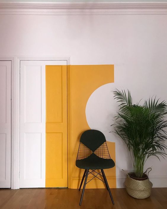 yellow and white color block is great for accenting any space and making it cooler and bolder without much effort and money