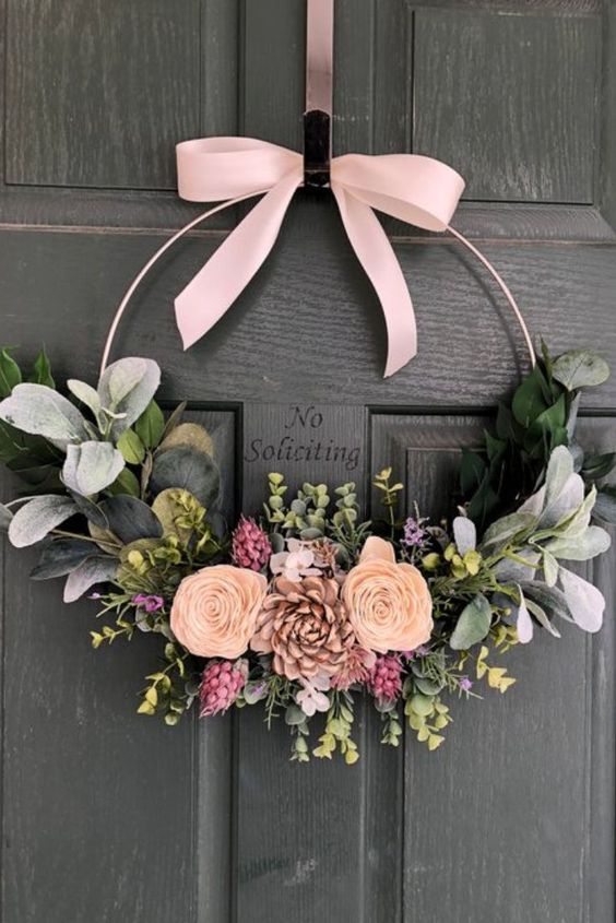 23 a modern spring wreath of a hoop, pink ribbon bow, peachy and pink blooms, greenery is a very cute and lovely idea