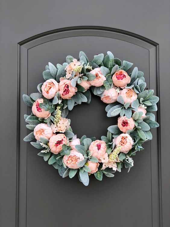 30 a romantic spring wreath of faux greenery, pink peonies and some more blooms is a very pretty and chic idea
