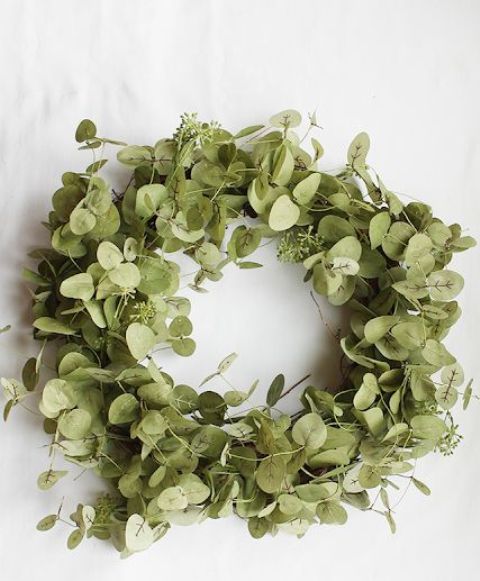 a simple eucalyptus wreath is a lovely spring decoration for your front door, and it won't wither