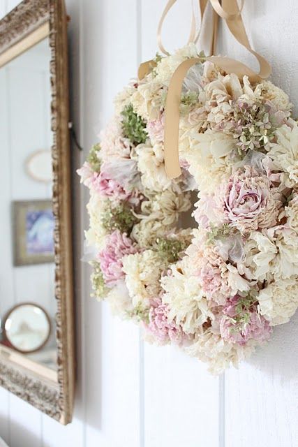 36 a simple pink, neutral and green bloom wreath and a neutral ribbon bow on top is a very long-lasting decoration