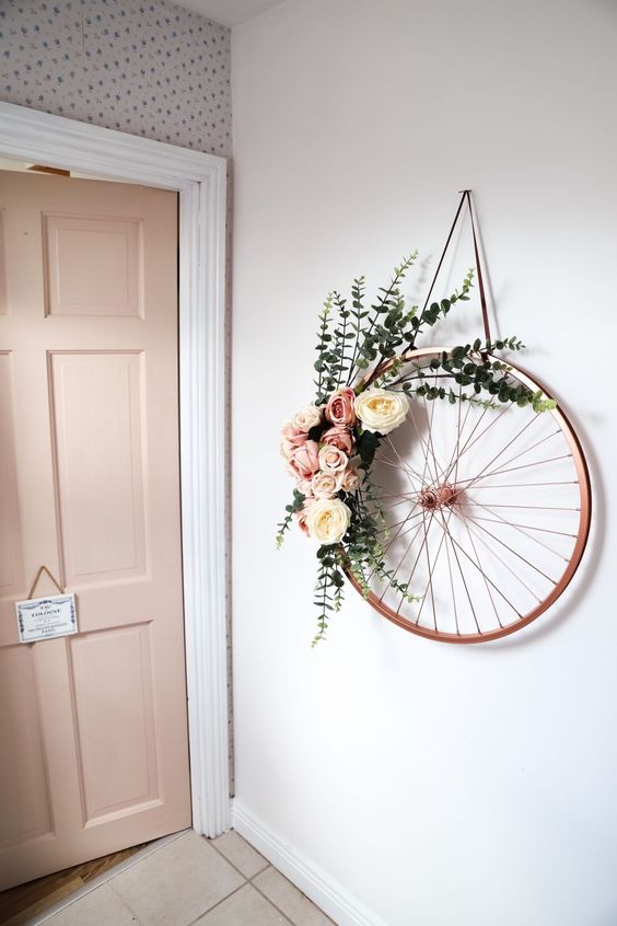 51 an old bike wheel wreath with pink and white blooms plus eucalyptus is a beautiful and rustic idea for spring