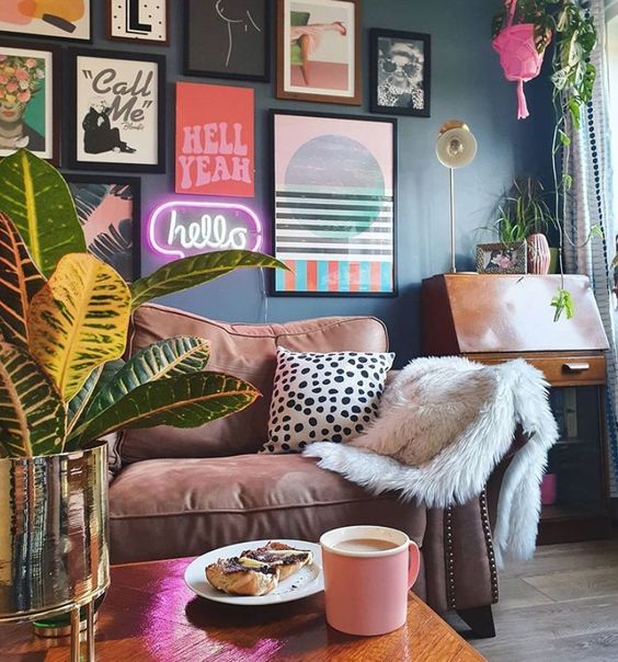 a funky gallery wall with bold prints and posters plus a neon light will add color and a fun touch to the space
