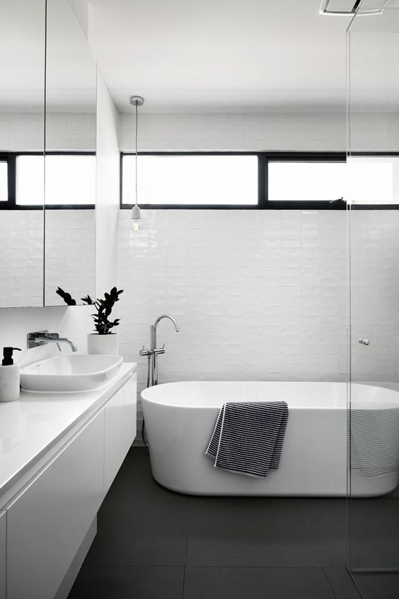 a cute black and white bathroom design