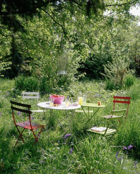 a pretty and light eating space with round tables and bright and pastel chairs is easy to compose anytime