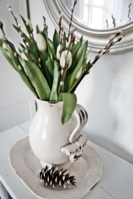 a vintage vase with willow and white tulips is a simple and pretty spring centerpiece or arrangement to rock