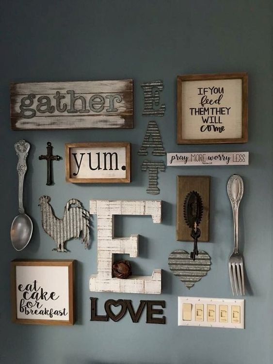 02 a farmhouse kitchen gallery wall with framed and non-framed signs, with letters, monograms and silhouettes of wood and metal