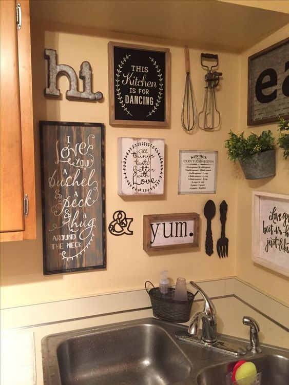 08 vintage and rustic kitchen wall decor with signs in frames, potted greenery, metal monograms and letters and kitchen stuff