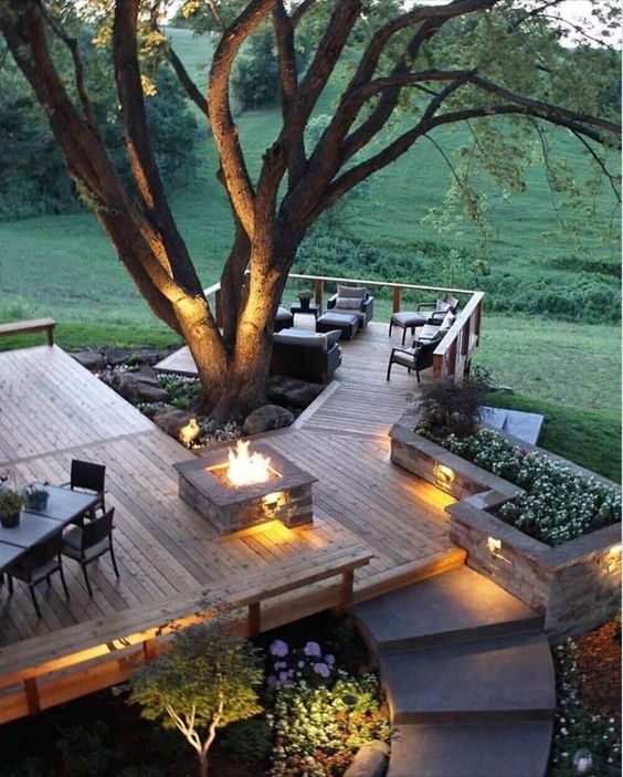 11 a fire pit and built-in lights make your outdoor space very welcoming and very chic