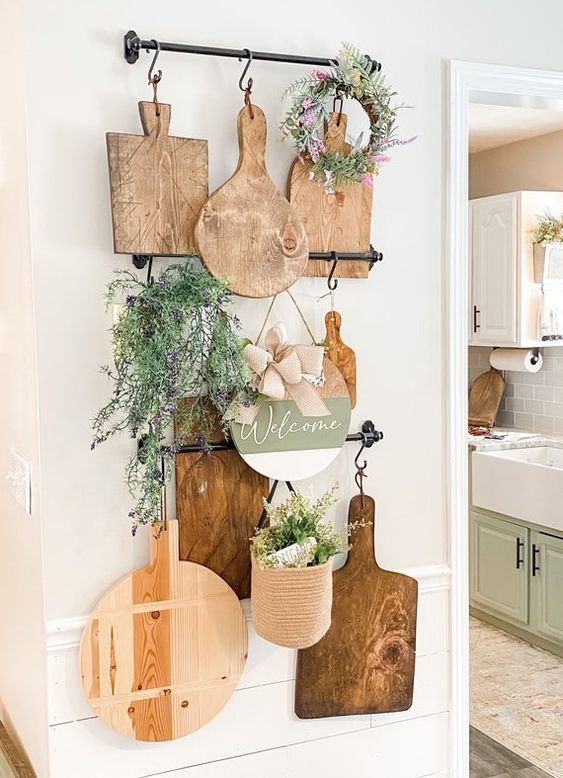 16 rustic kitchen wall decor with railings, cutting boards, greenery, potted and in a wreath is a lovely easy to realize idea
