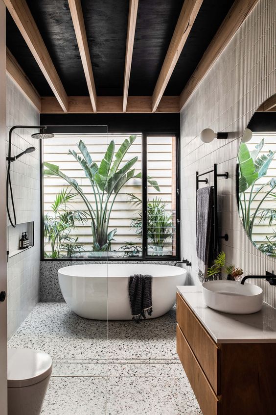 a cozy tropical bathroom design
