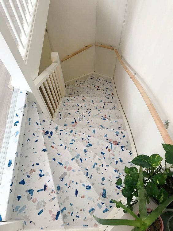 a staircase done with colorful terrazzo looks cheerful, bold and very cool and adds interest to all the spaces