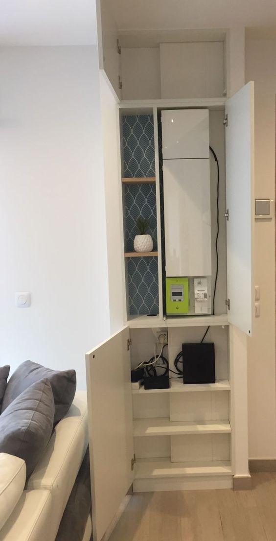 A built in storage cabinet with shelves and storage units can hide a wi fi router or some other stuff and declutter your space