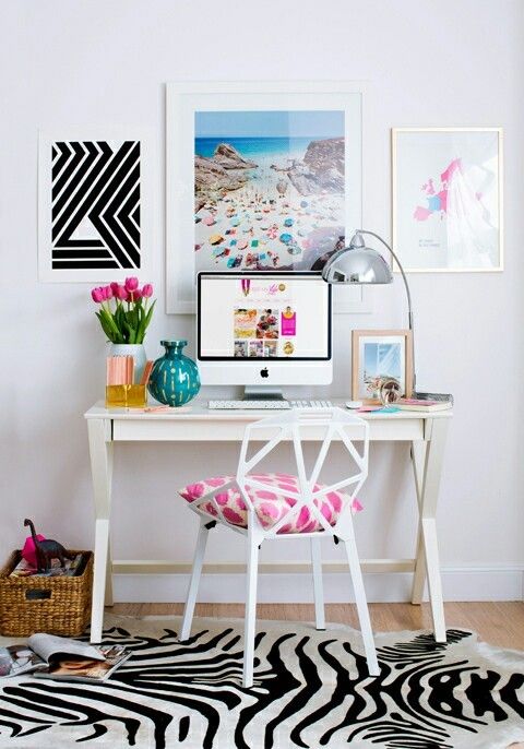 a cute simple home office with a trestle desk