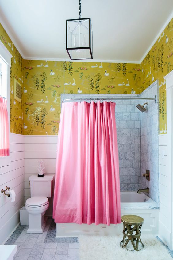 a printed wallpaper looks great in this bathroom