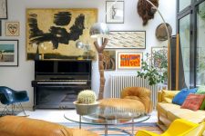 a living room with a bright yellow sofa