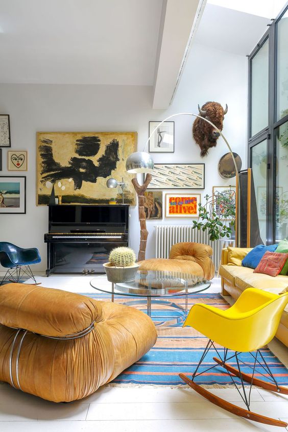 a living room with a bright yellow sofa