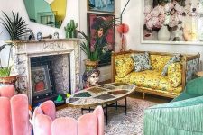 a maximalist living room with a yellow printed sofa, pink chairs and a green fringe sofa, bold artworks and a catchy mirror