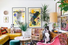 a maximalist living room with colorful furniture, rattan chairs, bright rugs, pillows and books and colorful gallery walls