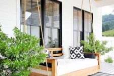 a daybed is the best addition to a porch
