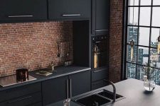 16 a fantastic industrial kitchen with red brick walls, black metal cabinets, concrete countertops and bulbs hanging over the space