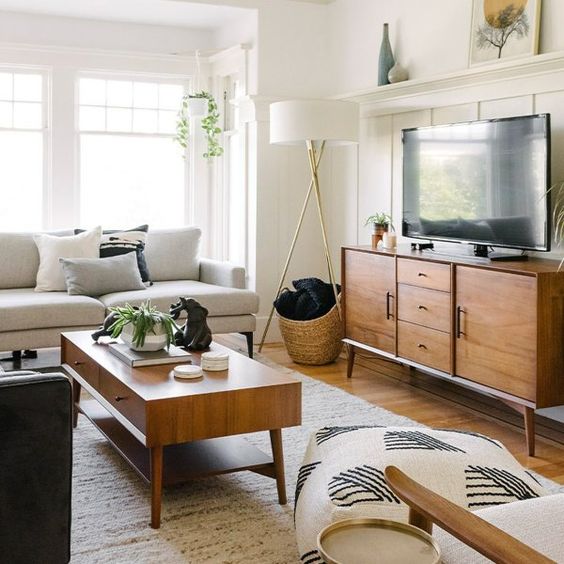 stained mid-century modern furniture - a TV unit and a coffee table add chic and coziness to the living room