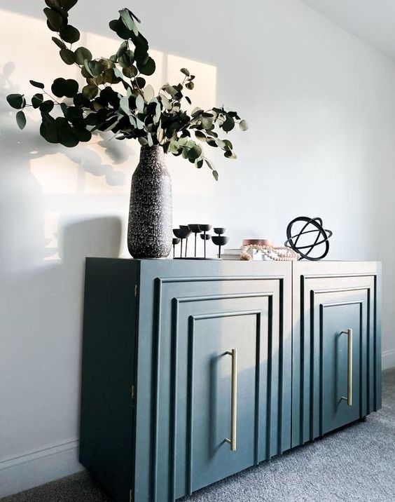 a plain Kallax shelf turned into a glam art deco furniture piece in navy blue is a very stylish idea