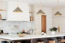 26 a chic farmhouse kitchen with white shaker style cabinets, a dark stained kitchen island with open shelves, grey pendant lamps