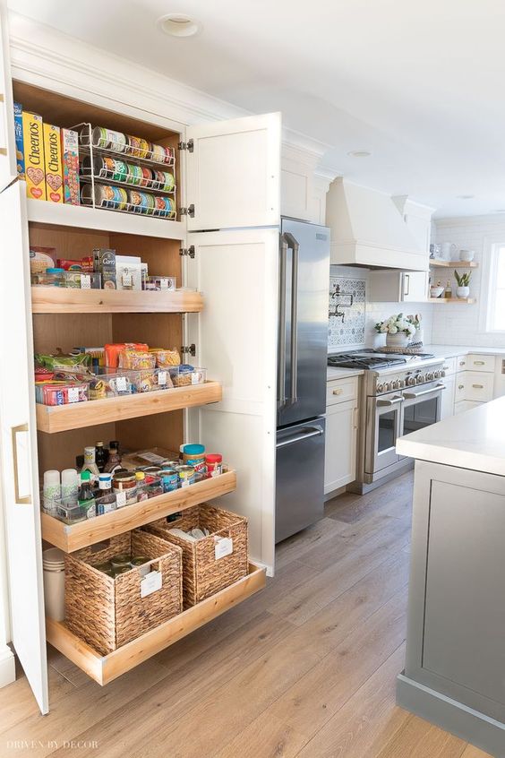 a mini pantry with drawers and doors is a lovely idea for those who don't have enough space for a large one