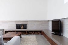 a modern living room with concrete floors