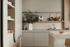 a dove grey contemporary kitchen with sleek cabinets, a bamboo backsplash, catchy curved details and open shelves is amazing