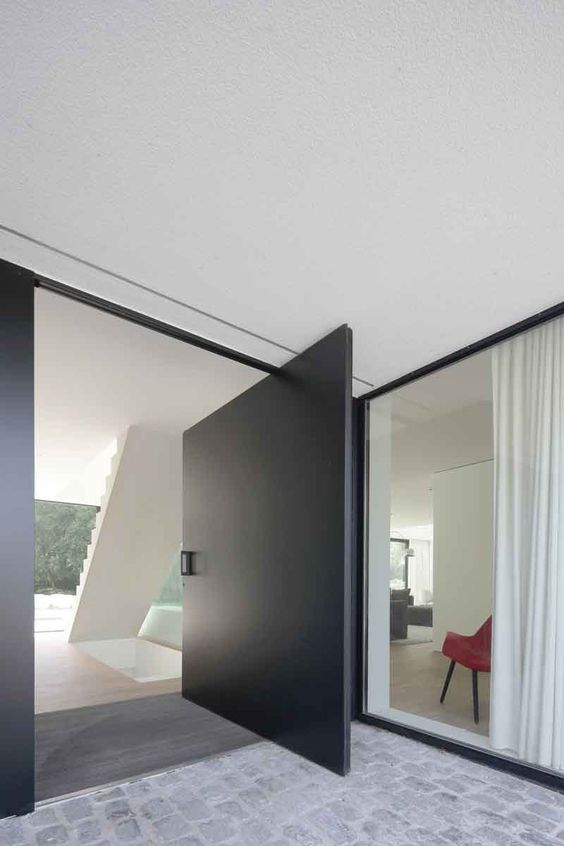 a fantastic sleek black entrance door will make a statement in your home, whether it's an entrance or a back garden door