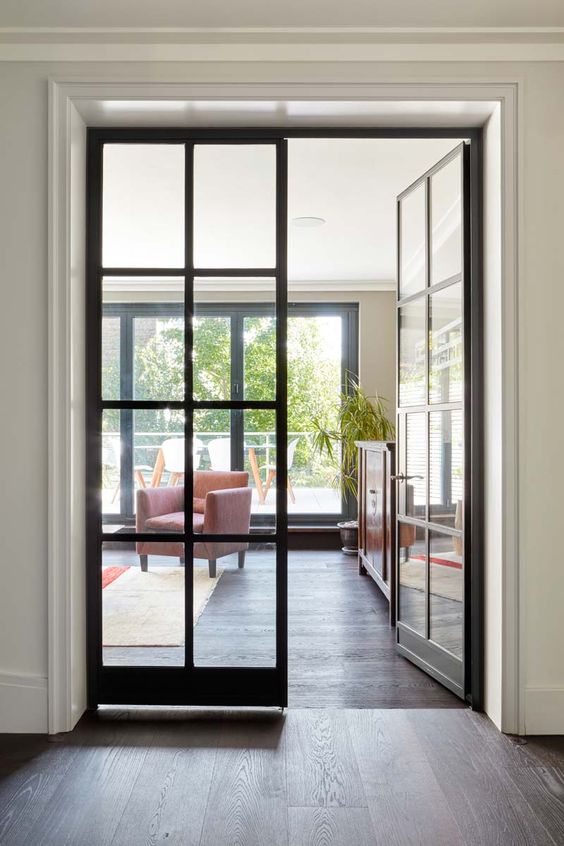 black French doors for inner spaces are a chic idea for many interiors - though they are black, they provide enough natural light