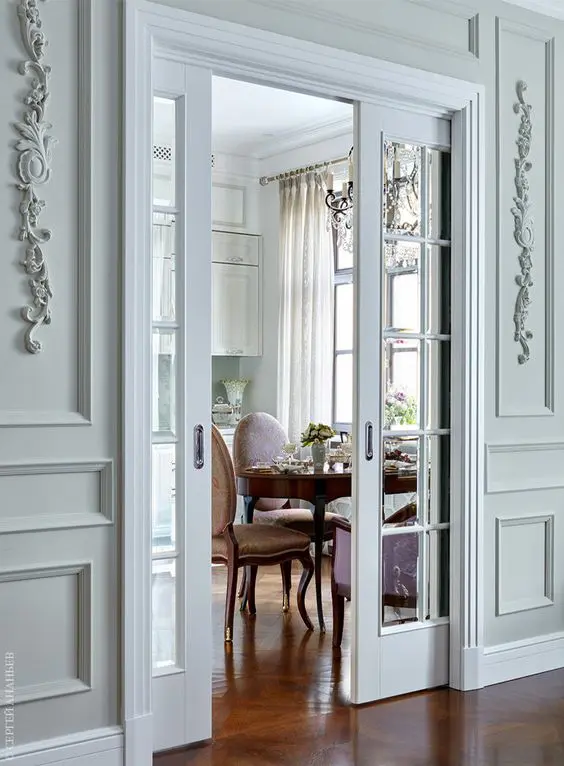 delicate white sliding French doors are adorable for refined spaces, too, they don't take space and delicately separate it