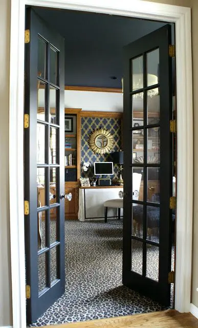 elegant black French doors add chic to the space and make the rooms more lovely and bold and look very lightweight at the same time