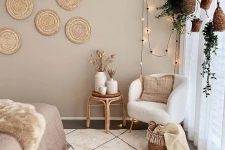 a cozy boho bedroom with taupe walls