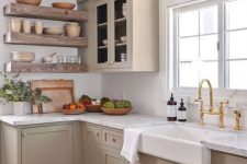 a taupe farmhouse kitchen design against white walls