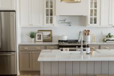 a cute two toned kitchen design
