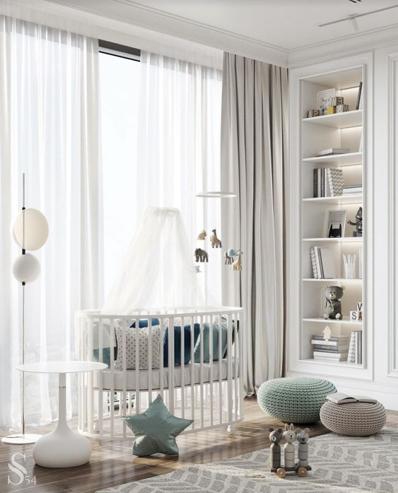 A stylish contemporary nursery with built in and lit up shelves, a white crib, a printed rug, grey and aqua touches plus floor lamps