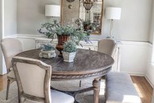 a stylish country dining room design in neutral tones