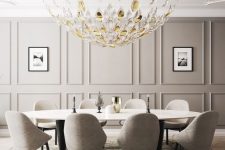 a gorgeous greige dining room with a paneled wall