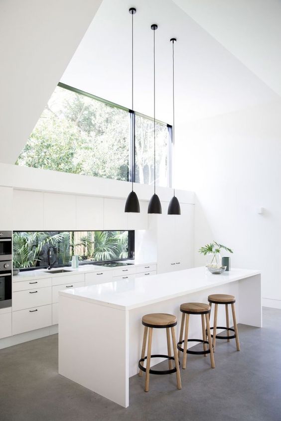 A double height ceiling is taken advantage with the help of a large window like skylight