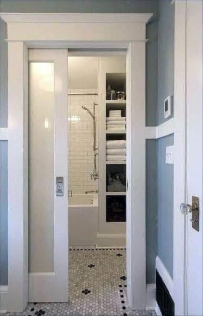 a frosted glass pocket door is a cool idea for many modern and famrhouse spaces and is an ideal solution to hide a bathroom