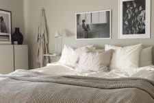 a soothing greige bedroom with neutral furniture, floating nightstands, a mini gallery wall and neutral and white textiles is very welcoming
