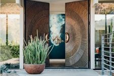 fantastic oversized metal front doors with a pattern is a gorgeous solution for a mid-century modern or modern house