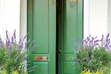 vintage doors made eye-catchy with just green paint and soem gold detailing are a great example of how to refresh your old doors