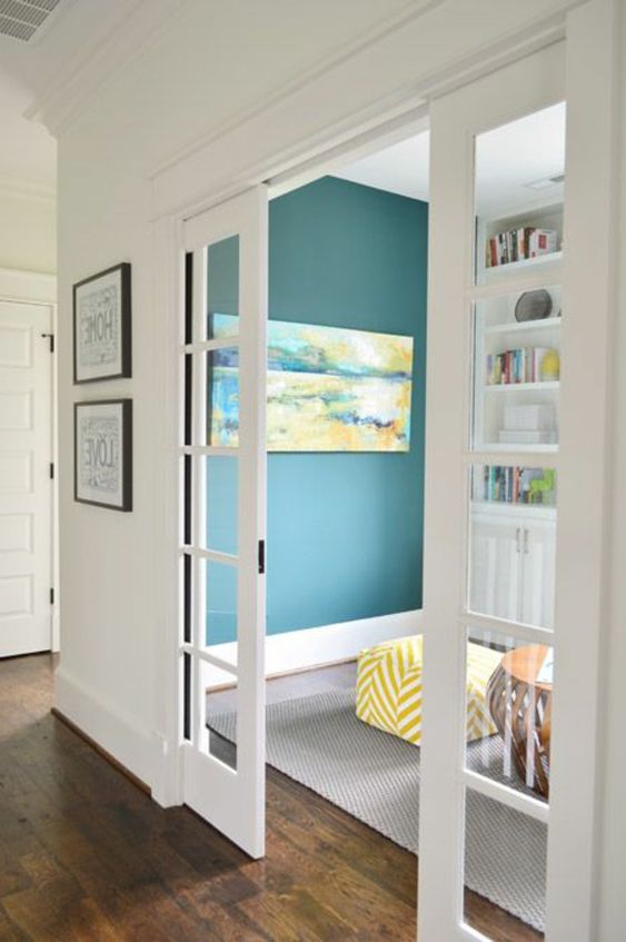 white French pocket doors are a stylish solution to separate the space and do it in a delicate way without heavy looks
