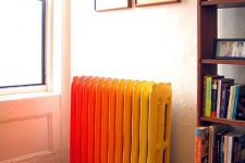 a super bold ombre yellow to red radiator is a fantatic way to add color to the space and make it stand out a lot