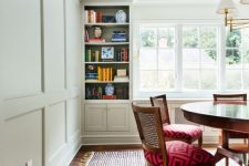 molding on the walls and crown molding that perfectly matches in color and makes the space look neater and more eye-catching